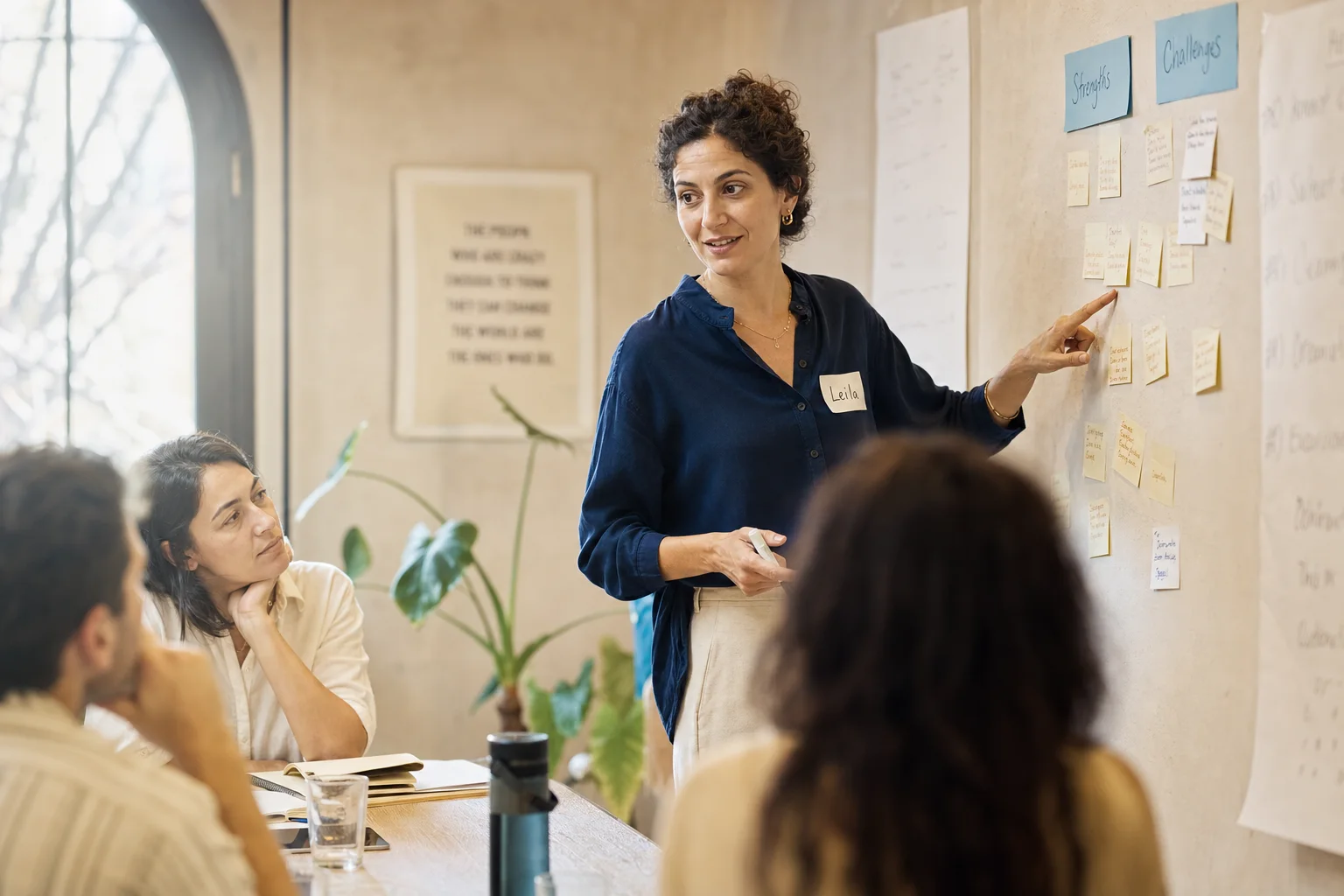 A facilitator guiding a civilian workplace workshop